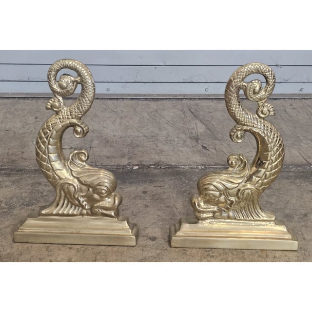 Store Item: Pair of Virginia Metalcrafters Brass Dolphin Andirons Rare Description: Cast Brass pair of Dolphin Andirons....