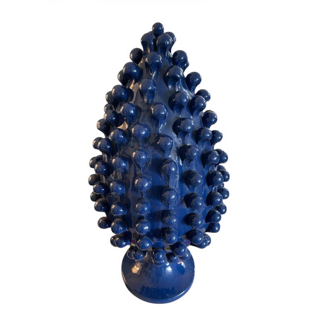 Enhance your space with this striking pair of vintage Italian ceramic pine cone statuettes, finished in a deep, high-gloss...