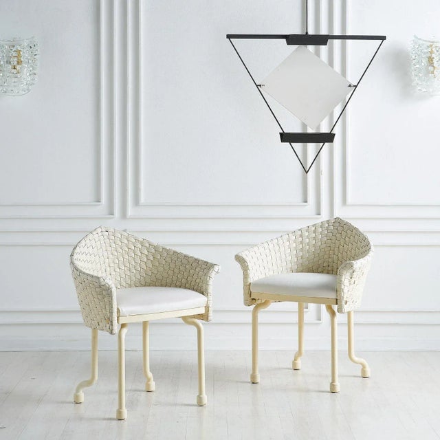 Designed by Swiss Architect Mario Botta (b.1943) for Artemide in the 1980s, this triangular pendant light has a black...