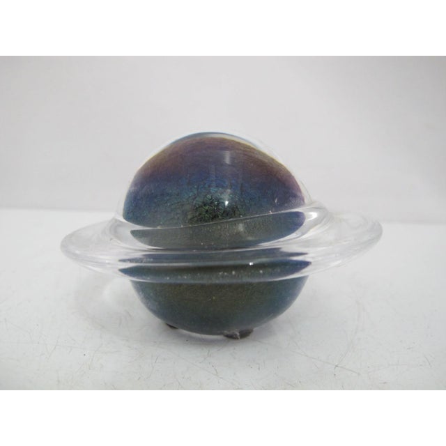 Fun art glass paperweight in out of this world, planet Saturn design. Measures 4" x 2 1/2" tall. Excellent condition, no...