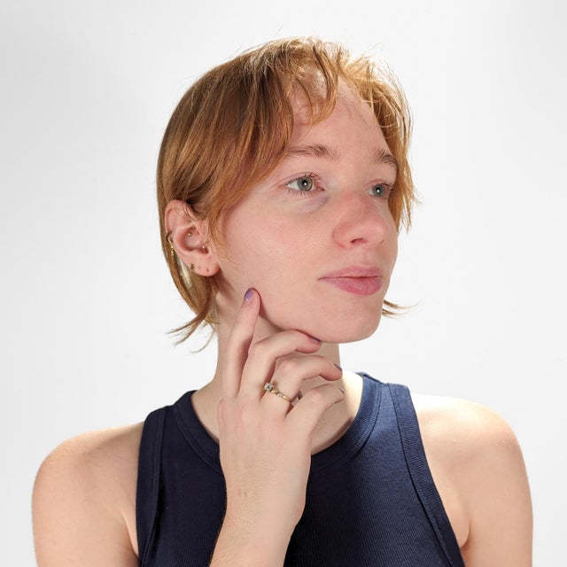 A very fine antique Edwardian 14 Karat gold and diamond engagement ring. With a round brilliant cut diamond pave set in...