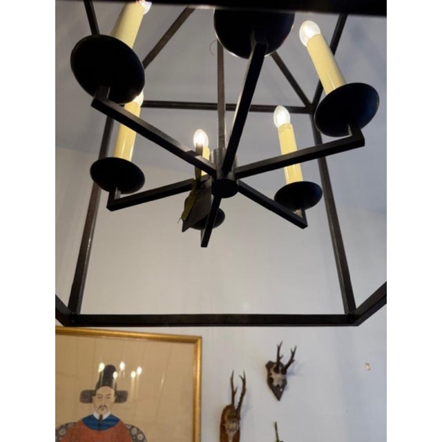 This is an XL Darlana lantern by Visual Comfort in Oil Rubbed Bronze. This is large and scale with 6 bulbs and would be...