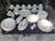 Mikasa's "Serenade" pattern with yellow calla lily flower detail. China crafted in Japan 48 pieces total set includes: 1 -...