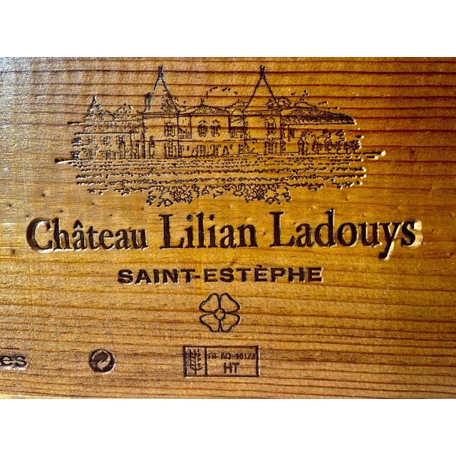 This charming wooden French wine crate is from Chateau Lilian Ladouys in the St. Estephe region from 2010. Makes a stylish...