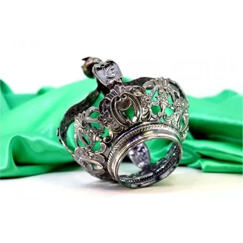 Silver Crown with Reliefs of Acanthus Leaves, in Very Good conditions. Designed 1890 to 1919 This piece has an attribution...