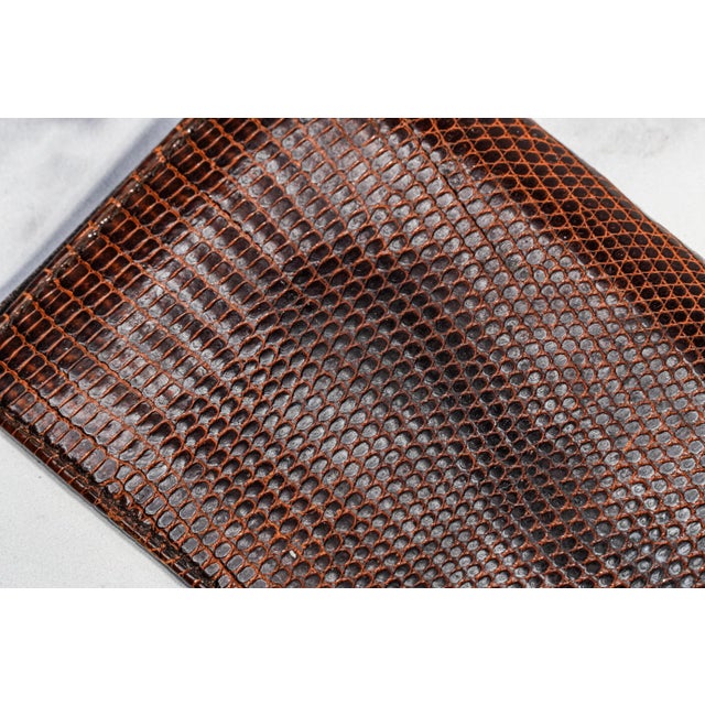 A sophisticated expression of understated luxury, this genuine Italian leather card wallet embodies the timeless elegance...