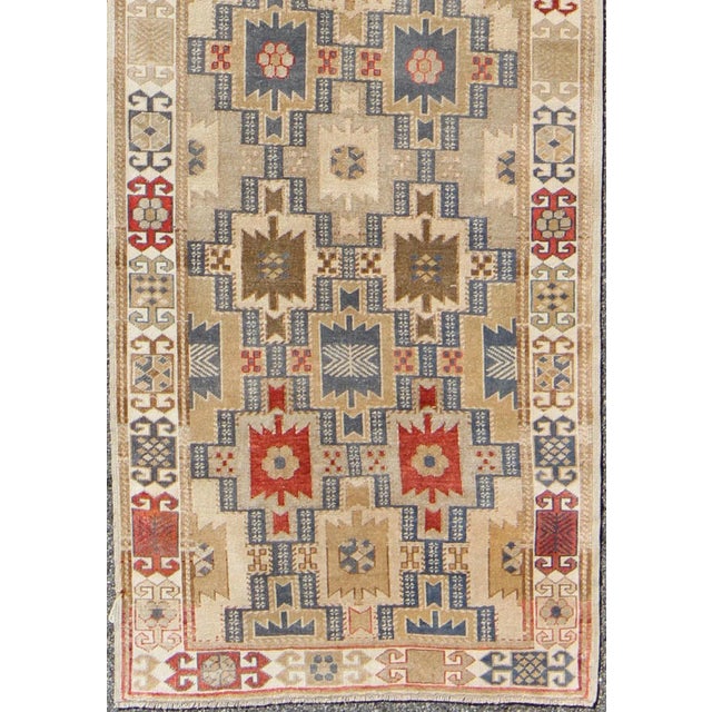 Measures: 3 x 11'6. Vintage Oushak Runner with Beige, Soft Blue, Red, and Taupe Geometric Design. Keivan Woven Arts / rug...