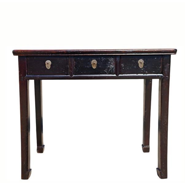 This antique 19th century table is a traditional three-drawer writing desk made from solid elm wood from the Shanxi...
