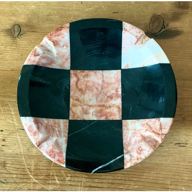 This striking postmodern ashtray is a superb example of 1980s geometric design. Expertly crafted from inlaid stone, the...