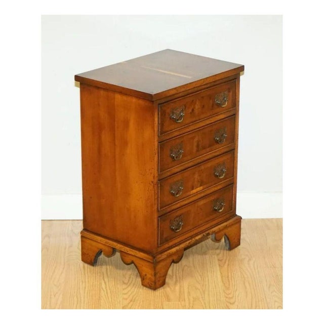 Outstanding distressed georgian style flamed yew wood small chest of drawers. A very lovely chest and can be used as a...