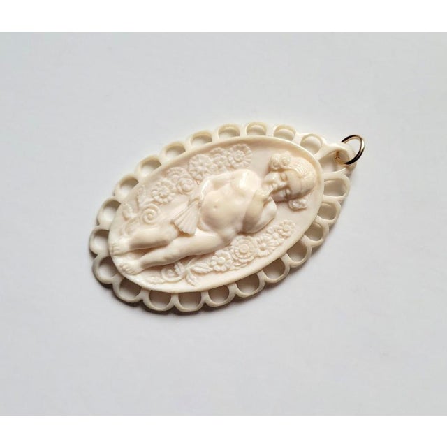 An utterly distinctive and truly captivating vintage treasure! This Victorian cameo, meticulously crafted from ivory,...