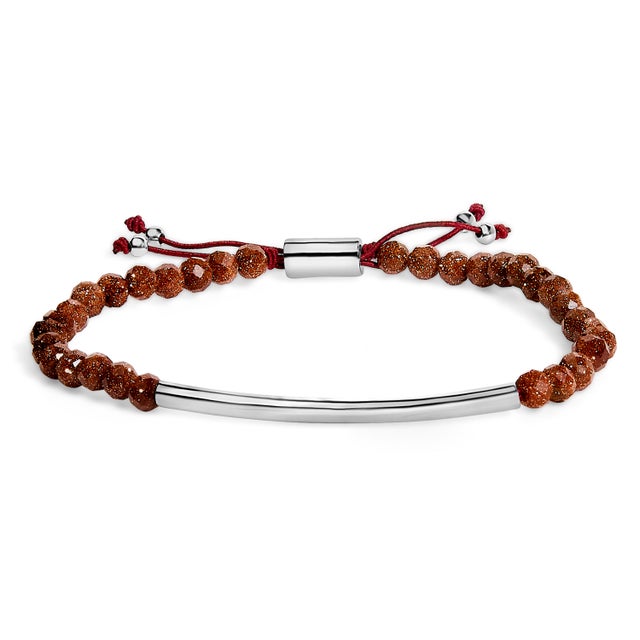 Immerse yourself in the understated elegance of this .925 sterling silver bracelet, where the enduring shimmer of...