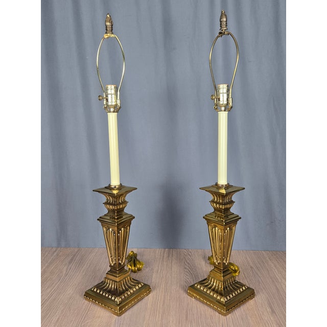Pair of handsome brass lamps by Stiffel. Classic form, nice finials, healthy size and nicely made. These have the familiar...