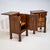Pair of Empire bedside cabinets veneered in walnut and raised on tall square legs with block feet. The sides are decorated...