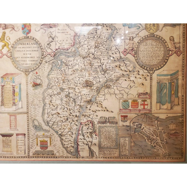 An extraordinary framed 17th-century map of Cumberland County in northwest England, printed in 1610 by famed English...