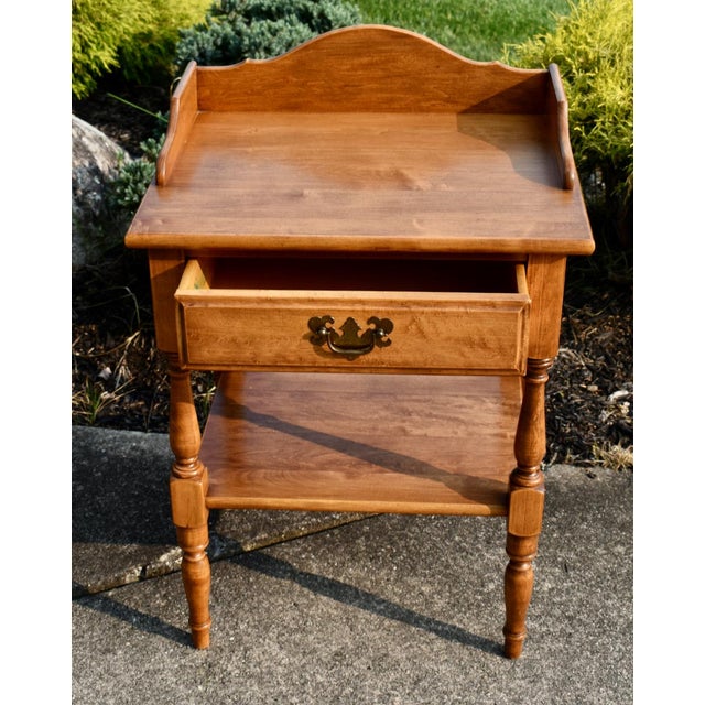Vintage (1960's) Side/End Table has an Americana Style. Made by Heywood Wakefield. The Table has a Bottom Shelf, One...