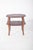 Oak coffee table. With an octagonal design and a dark finish, it has two shelves, top and bottom, ideal for supporting...