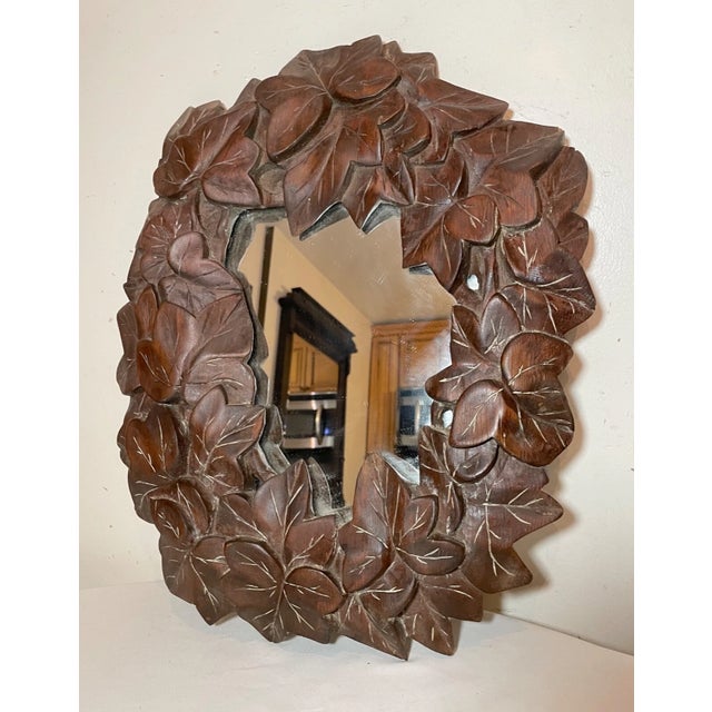 Up for sale is a very nice quality antique hand carved wooden Folk Art wall mirror. This lovely sculpture is done in high...
