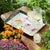 Bring the beauty of nature indoors with the Wildflower Insect Print Tray. Featuring soft green, yellow, and purple...