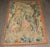 A Flemish rustic tapestry from the 18th century, depicting a charming scene with two young noblemen pulling a young damsel...