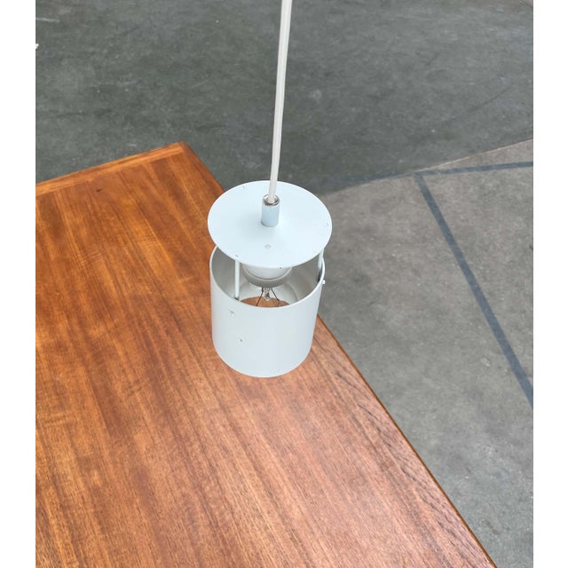 Minimalist pendant lamp by the danish manufacturer lys, designed by asger bay christiansen in the 1960s. a functional...