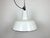 Industrial white enamel pendant light made by Zaos in Poland during the 1960s. White enamel inside the shade. Cast iron...