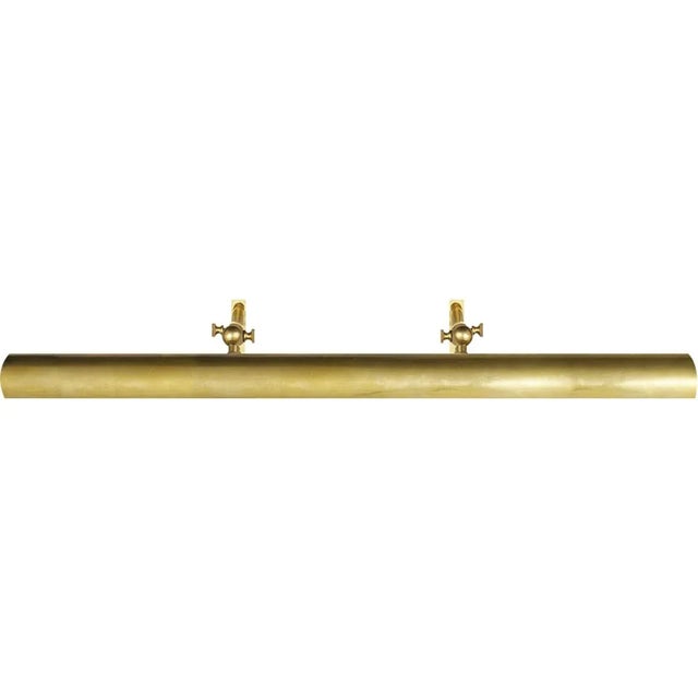 Frame Makers 30" Picture Light in Hand-Rubbed Antique Brass Designer: Chapman & Myers Height: 1.5" Extension: 9" Mounting:...