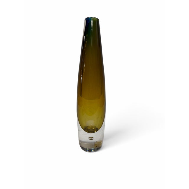 Elevate your space with a striking piece of Scandinavian modernism. Designed by iconic glass master Vicke Lindstrand for...