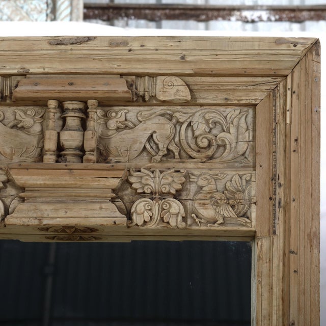Antique Indian Bleached Teakwood Carved Door Frame, from the south of India, with a fine, relief carved top pediment. A...