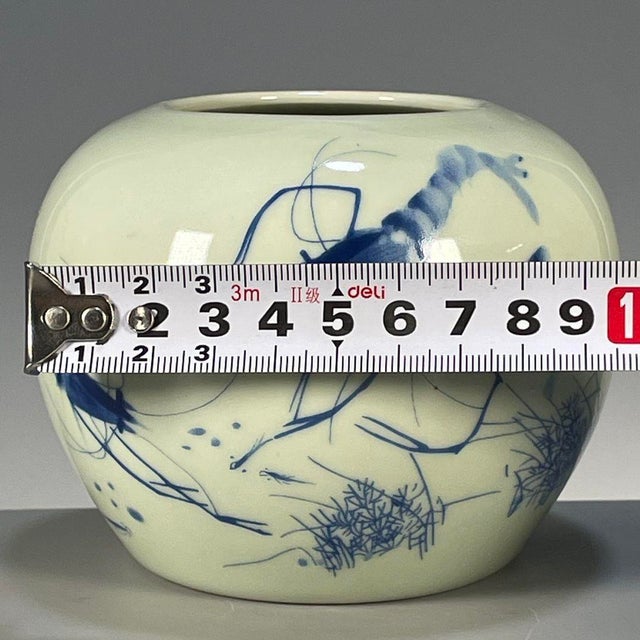 Dimensions: Height 10cm (3.94") x Diameter 13cm (5.12") Material: Glazed Porcelain, Blue & White Underglaze, Celadon Glaze...