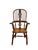 English Windsor Armchair, Circa 1880. This Victorian-style English Windsor armchair, circa 1880, is crafted from oak. It...