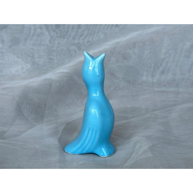 Display this whimsical ceramic blue bird figurine as decor on a kitchen shelf when you are not using it to vent a double-...