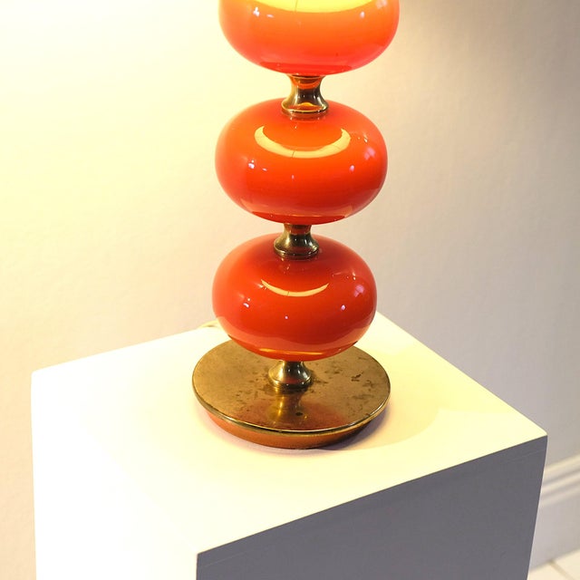 Fantastic lamp with a fantastic light from the original warm orange shade. Glass spheres in mint condition. A little...