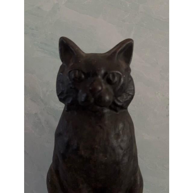 Beautiful large doorstop of figural sitting cat. By Hubley, circa 1930s. Made of cast iron. Heavy and substantial.