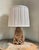 This is an exceptional antique lamp, hand carved of soapstone, richly textured in a rose, tan and cream tint. The carvings...