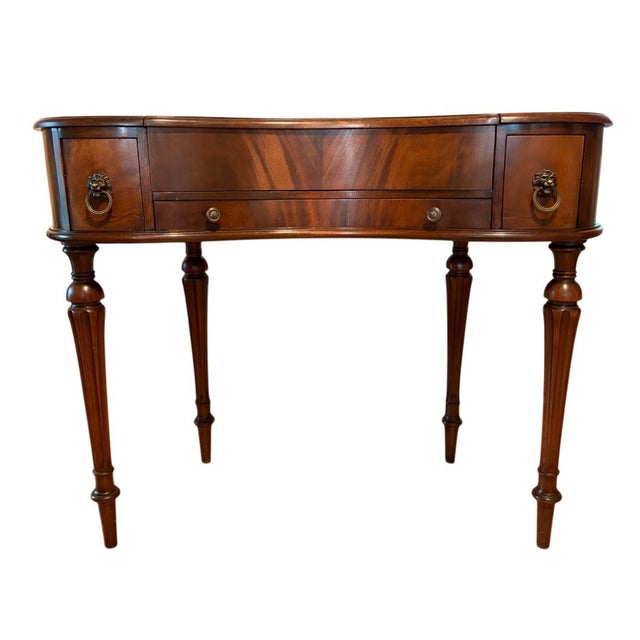 Beautiful authentic mid-century Colonial Revival kidney-shaped kneehole writing desk manufactured by the prestigious...