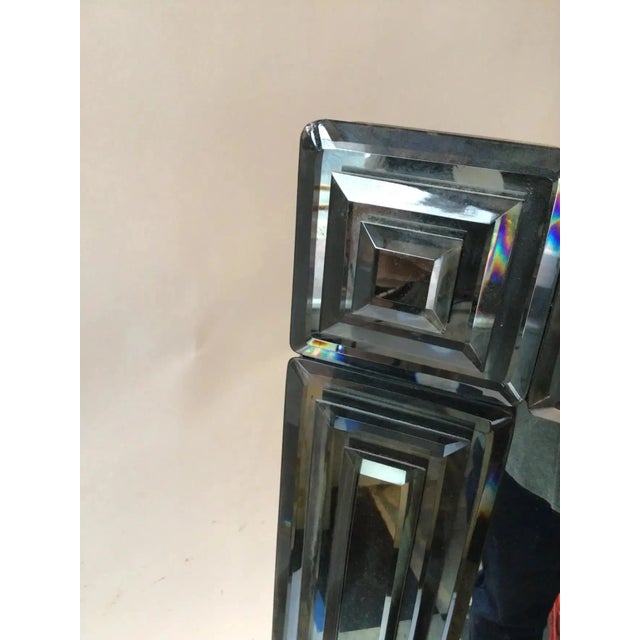 1980s Beveled mirror. Tiny chip in glass in one corner as shown in second to last picture.