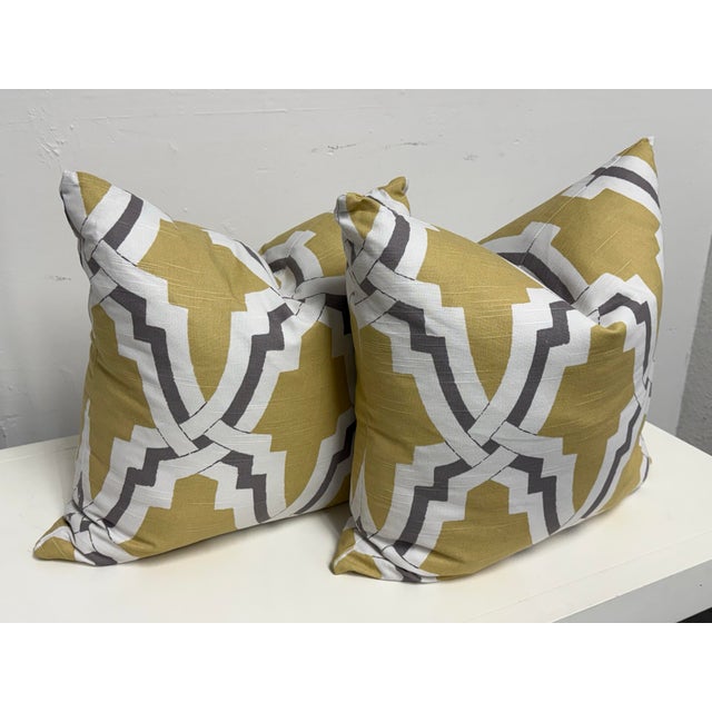 Design Plus Gallery presents a Pair of Niche Geometric Decorative Pillows from Eastern Accents. This pair showcases a...
