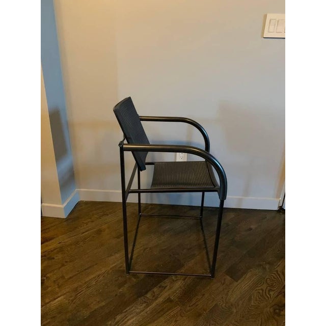 This is the Maurizio Peregalli "Comoda" Chair for Zeus Noto. It is a minimal postmodern 1980s design in black painted...