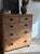 Five-drawer English pine chest in the classic Victorian two-over-three configuration, ebonised turned knobs set against...