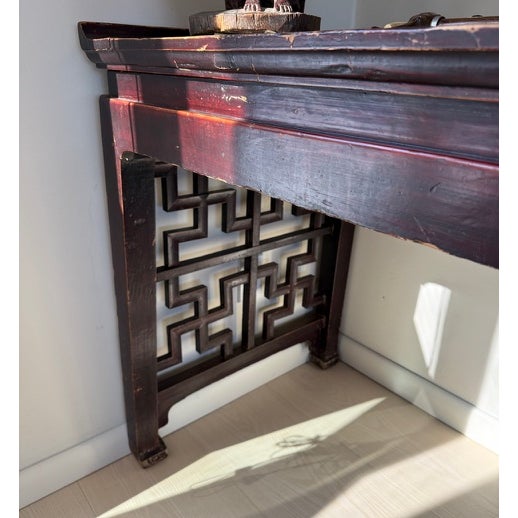 19th Century Chinese Alter table wood 3'2" W x 11'7" L x 2'3" D (97 x 353 x 70 cm). Artfully carved geometric designs and...