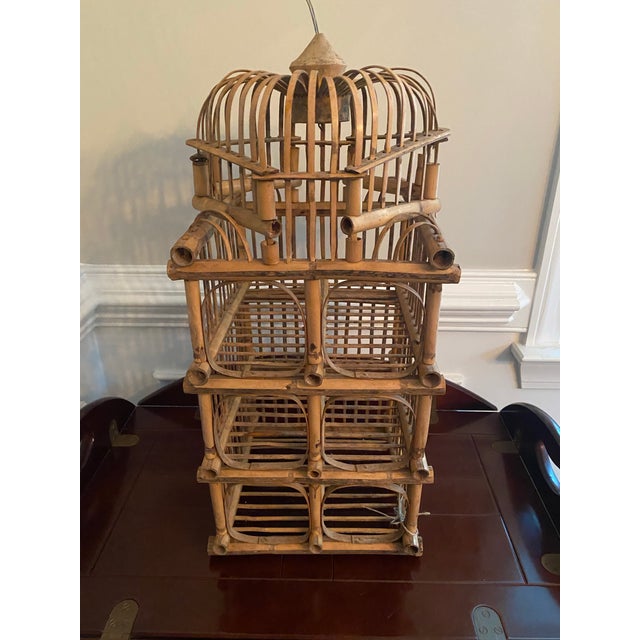 Asian style pagoda rattan bamboo wine bottle rack. 24” tall x 11” square.