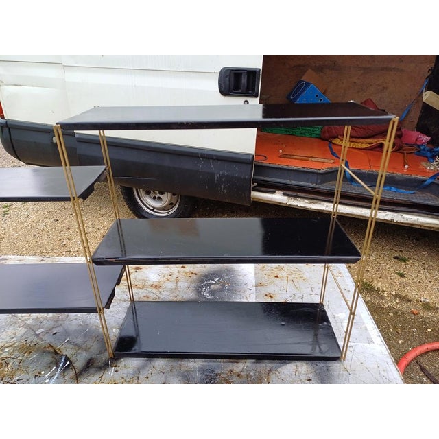 String Tomado shelving unit from the 1960s, gold and black metal, Height: 50 cm, Length and Width: 143 cm x 17 cm, 8...