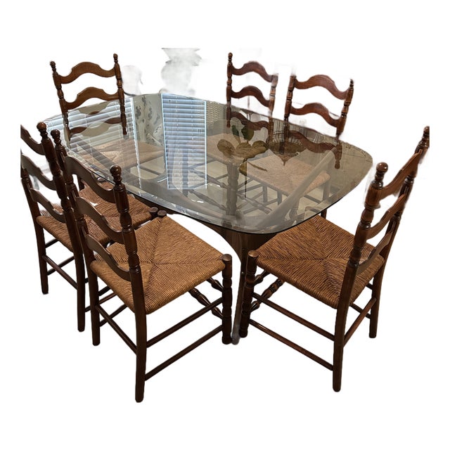 62" Oblong Beveled Glass Table With a “Organic Modernism" Base and Six (6) Wooden Ladder Back and Rush Chairs For Sale