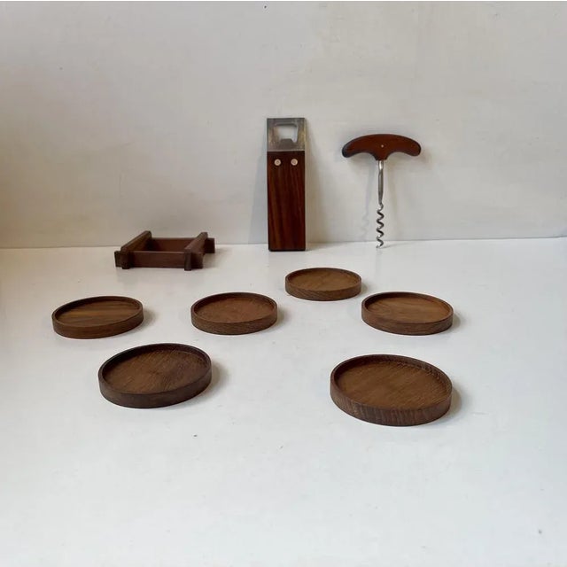 Midcentury bar-set with the following accessories: lime/cheese knife, Corkscrew with solid teak handle, rectangular large...