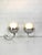 Pair of Space Age table lamps designed in the style of Gino Sarfatti for Arteluce. A chromed ball is hold by a folded...
