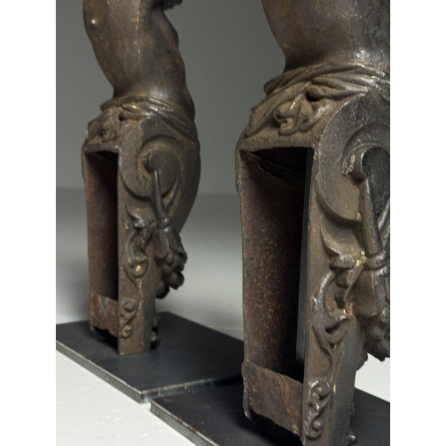 Two cast iron angels on stands. These statues are crafted from cast iron. Originally from France, 19th century. Standing...