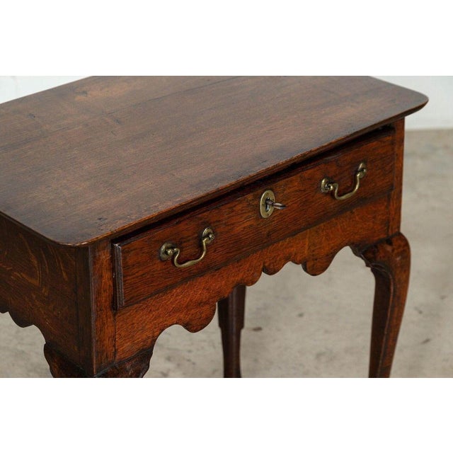 Circa 1770 english 18thc oak low boy lamp table w71 x d44 x h73 cm up to 250v (europe/uk standard).the wiring of this item...
