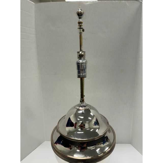 Antique English urn with rams head and ring handles and finial. Square pedestal base with ball foot and fluted detail....