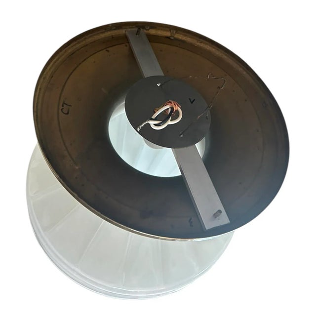 What an incredible pair of classic flushmounts. The bronze holders have all original patina. Simply stunning! Canopy width...